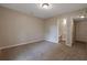 Bedroom with neutral carpet and paint features easy access to ensuite bathroom at 785 Redland Dr, Jonesboro, GA 30238