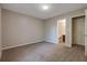 Comfortable bedroom featuring plush carpeting and neutral walls, perfect for relaxation and restful sleep at 785 Redland Dr, Jonesboro, GA 30238