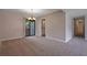 Dining room features a modern chandelier and sliding glass doors to the backyard at 785 Redland Dr, Jonesboro, GA 30238