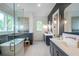 Beautiful bathroom featuring a soaking tub, dual vanities, and modern fixtures, perfect for relaxation and pampering at 12520 Celestine Way, Milton, GA 30075