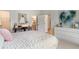Light and airy bedroom with desk and drawers featuring large window at 12520 Celestine Way, Milton, GA 30075