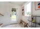 Mud room and entryway offer space with clean white walls and an exterior view at 12520 Celestine Way, Milton, GA 30075