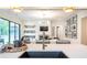 Open concept kitchen and living room with modern furnishings and decor at 12520 Celestine Way, Milton, GA 30075