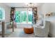 Cozy sitting room with comfortable seating, natural light, and stylish decor at 12520 Celestine Way, Milton, GA 30075