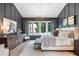 Beautifully designed main bedroom featuring tray ceilings, recessed lighting and neutral colors at 12520 Celestine Way, Milton, GA 30075
