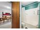 A view from a doorway shows the kitchen and bathroom at 3003 Butler Creek Nw Rd, Kennesaw, GA 30152