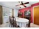 Elegant dining room with a classic chandelier, a large table, and traditional decor for Gathering gatherings at 3003 Butler Creek Nw Rd, Kennesaw, GA 30152