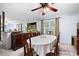 Spacious dining room with a formal table, classic furnishings, and an open connection to the living area at 3003 Butler Creek Nw Rd, Kennesaw, GA 30152