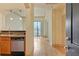 Open-concept view of the kitchen and living area with hardwood floors at 3445 Stratford Ne Rd # 305, Atlanta, GA 30326