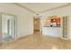 Bright, open-concept living room with hardwood floors and an archway to the kitchen at 3445 Stratford Ne Rd # 305, Atlanta, GA 30326