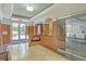 Modern lobby reception area with clean lines, wood accents, and glass doors to the gym at 3445 Stratford Ne Rd # 305, Atlanta, GA 30326