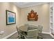 Conference room features a round table, chairs, and wall decor at the Paramount Buckhead condominium at 3445 Stratford Ne Rd # 305, Atlanta, GA 30326