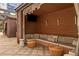 Relaxing outdoor lounge area with comfortable seating, a TV, and a stylish wicker table at 3445 Stratford Ne Rd # 305, Atlanta, GA 30326
