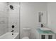 Stylish bathroom with a vessel sink, modern fixtures, and tiled shower at 3634 Oakleaf Pass, Fairburn, GA 30213
