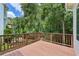 Wooden deck showcasing backyard landscaping and wooded area at 4058 Vinings Mill Se Trl, Smyrna, GA 30080