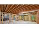 Unfinished basement with exposed wood framework and insulation at 4058 Vinings Mill Se Trl, Smyrna, GA 30080