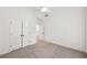 Bright bedroom featuring carpeted floors, white walls, bright lighting, and a closet at 4058 Vinings Mill Se Trl, Smyrna, GA 30080