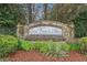 Stone sign with landscaping for Olde Vinings Mill neighborhood at 4058 Vinings Mill Se Trl, Smyrna, GA 30080