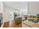 This updated kitchen features granite countertops, white cabinets, an island, and stainless steel appliances at 4058 Vinings Mill Se Trl, Smyrna, GA 30080