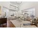 Open-concept living area leading into a dining room and kitchen with lots of natural light at 4058 Vinings Mill Se Trl, Smyrna, GA 30080