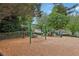 Community playground offering swings, slides, a picnic table and other recreational structures at 4058 Vinings Mill Se Trl, Smyrna, GA 30080