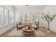 Sitting area features bright, natural light from windows with shutter blinds at 4058 Vinings Mill Se Trl, Smyrna, GA 30080
