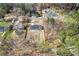 Aerial shot of a fenced-in backyard with a lawn, offering privacy in a serene, wooded setting at 5109 Dogwood Hills Dr, Sugar Hill, GA 30518