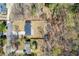 An aerial view of a well-maintained property with a spacious backyard and new privacy fence at 5109 Dogwood Hills Dr, Sugar Hill, GA 30518