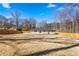 Expansive backyard with a wooden fence surrounding the property at 5109 Dogwood Hills Dr, Sugar Hill, GA 30518