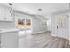 Eat-in kitchen with quartz countertops, bright cabinetry, and stainless steel appliances at 5109 Dogwood Hills Dr, Sugar Hill, GA 30518