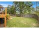 Lush backyard featuring a well-maintained lawn and privacy fence at 3013 Surrey Ln, Atlanta, GA 30341