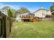 Well-manicured backyard featuring a wooden fence and mature trees at 3013 Surrey Ln, Atlanta, GA 30341