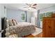 Cozy bedroom with hardwood floors, natural light, and stylish decor at 3013 Surrey Ln, Atlanta, GA 30341