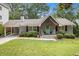 Charming single-story home with a welcoming front porch and beautifully landscaped yard at 3013 Surrey Ln, Atlanta, GA 30341
