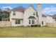 A spacious backyard with an ample grass area perfect for outdoor entertaining or relaxing at 4207 Fortune Pt, South Fulton, GA 30349