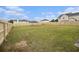Spacious backyard with a large grassy area and a gazebo at 4207 Fortune Pt, South Fulton, GA 30349