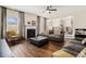 Inviting living room with a fireplace, hardwood floors, and neutral decor at 4207 Fortune Pt, South Fulton, GA 30349