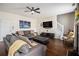 Spacious living room with hardwood floors, and comfortable seating at 4207 Fortune Pt, South Fulton, GA 30349