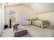 A spacious bedroom featuring carpeted floors and vaulted ceilings at 4207 Fortune Pt, South Fulton, GA 30349