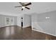 Open living space with hardwood flooring and French doors leading to the backyard at 4665 Big Valley Rd, Stone Mountain, GA 30083