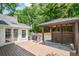 Backyard features a wood deck, outdoor grill, and a gazebo at 615 Woodwork Way, Roswell, GA 30076