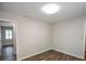 Bedroom featuring new floors, base trim and new light fixture at 615 Woodwork Way, Roswell, GA 30076