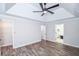 A bedroom with a ceiling fan, recessed lighting, and an adjoining bathroom at 615 Woodwork Way, Roswell, GA 30076