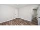 Bedroom featuring new floors, base trim and natural light at 615 Woodwork Way, Roswell, GA 30076