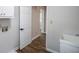 Laundry room with a window, utility sink, and a washer and dryer hookup at 615 Woodwork Way, Roswell, GA 30076