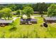 Aerial view of the property with a backyard, shed, and wooden deck at 6213 Cherry Ln, Douglasville, GA 30134