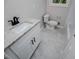 This bathroom features granite countertops and modern hardware at 6213 Cherry Ln, Douglasville, GA 30134