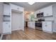 Beautiful kitchen features white cabinets and stainless steel appliances at 6213 Cherry Ln, Douglasville, GA 30134