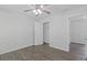 This bedroom features hardwood floors, closet and ceiling fan with lighting at 4353 Pond Edge Rd, Snellville, GA 30039