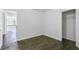 Bedroom with hardwood floors, white walls, and closet at 4353 Pond Edge Rd, Snellville, GA 30039